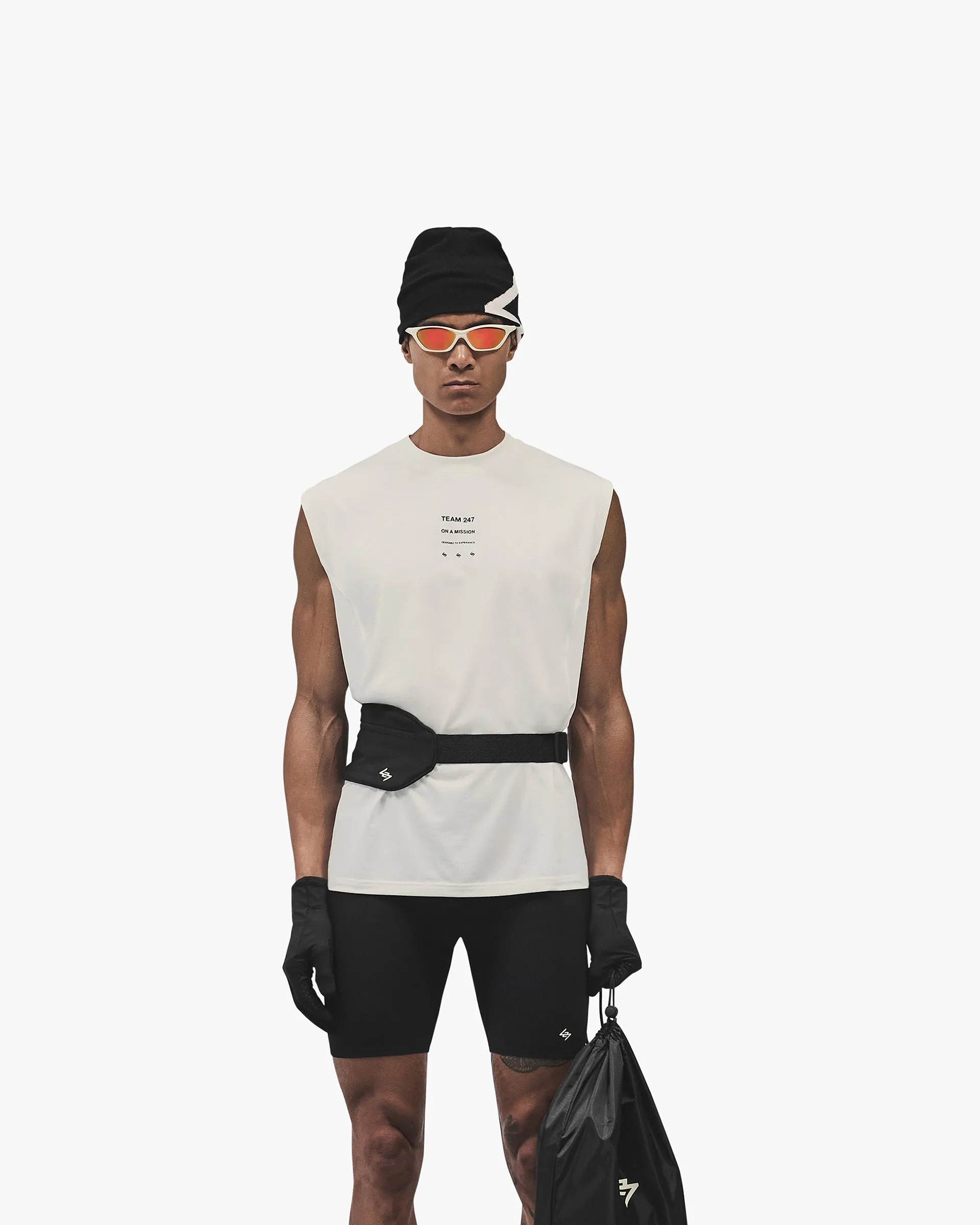 Non Irritating Tags graduation 247 Uprising Oversized Tank - Flat White