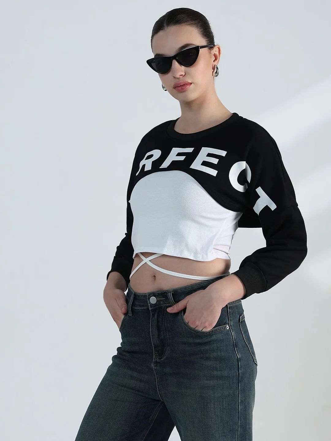 eyewear accents Travel Relaxed Women's Graphic Black Crop Sweatshirt with Wrap Detail
